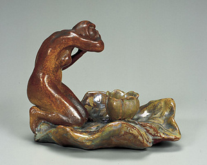 女性水浴蝋燭立