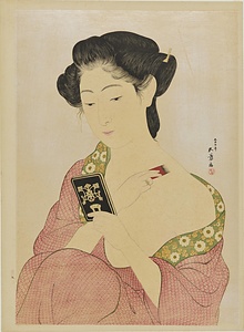 化粧の女