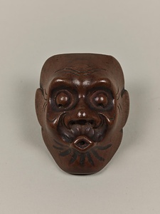 火吹面木彫根付