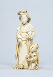 牙彫婦人小児像