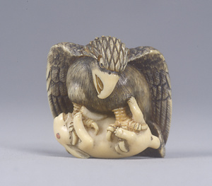 猛禽捕兎牙彫根付