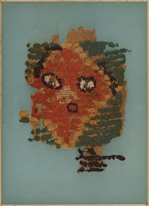 人面刺繍織物断片