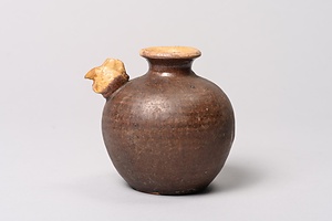 褐釉黄彩鳥形小壺