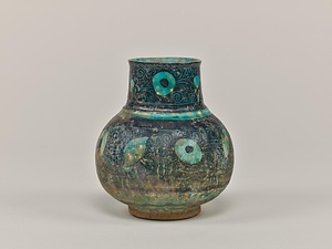 青緑釉下黒スリップ掻落壺