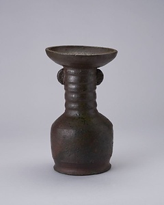 褐釉尊形双耳花生