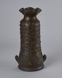 褐釉蘇鉄形筒花生