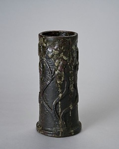 褐釉貼付花文筒花生