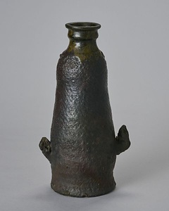 褐釉蘇鉄形筒花生