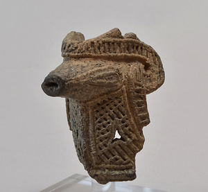 朝日貝塚出土獣面把手